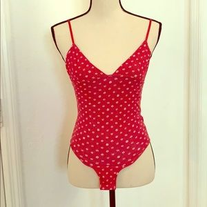 Red and white flowered onesie 🥰